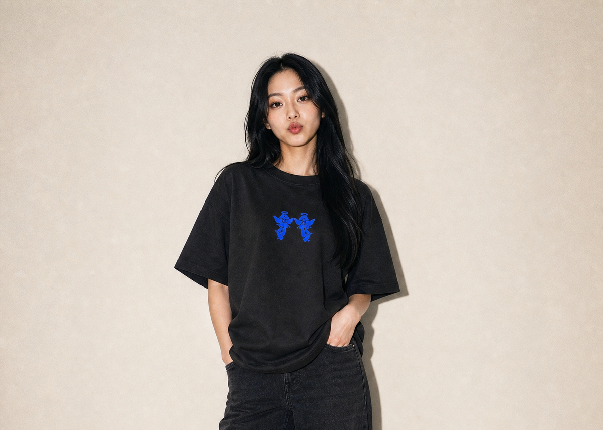 First Rites F/W '26 — model in the Twin Angels Boxy Tee, black